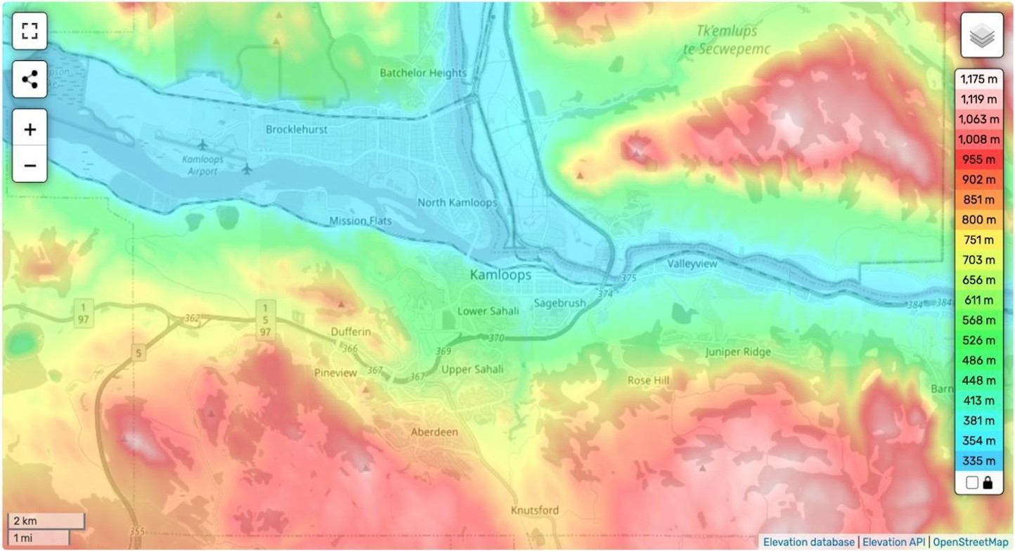 Topographic map of Kamloops, B.C., showing elevation changes from the river valley (low - 333 m) to surrounding hills (high - 1,742 m) with major neighborhoods, roads, and Kamloops Airport labeled.