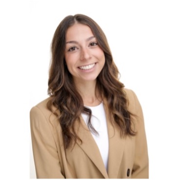 A person smiling at the camera

            AI-generated content may be incorrect.